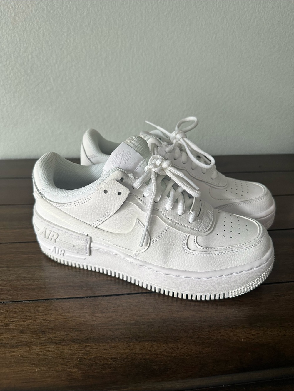 Nike All-White Air Force 1 Low Top Sneakers